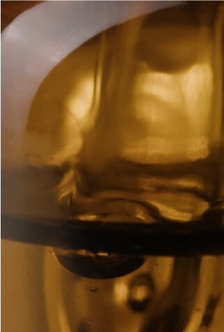 Close-up of amber glass packaging