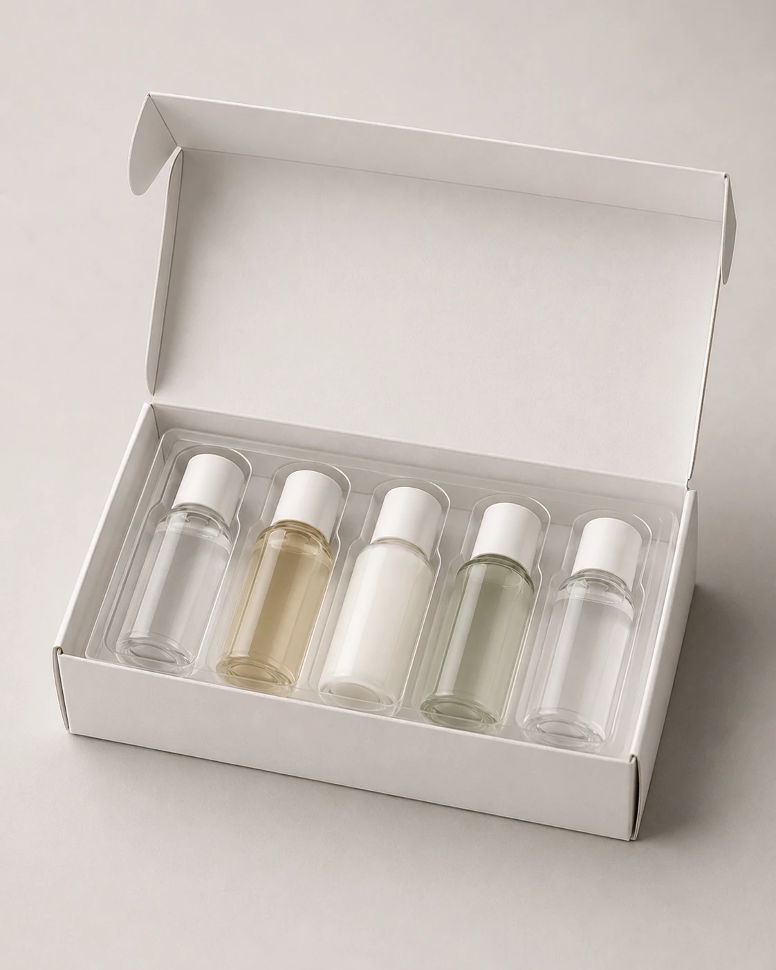 Example of a simplified multi-bottle folding-carton structure with thermoformed retention